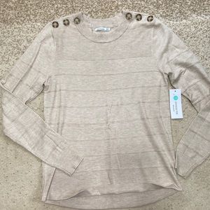 Olea shoulder button detail